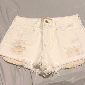 Distressed white hollister shorts